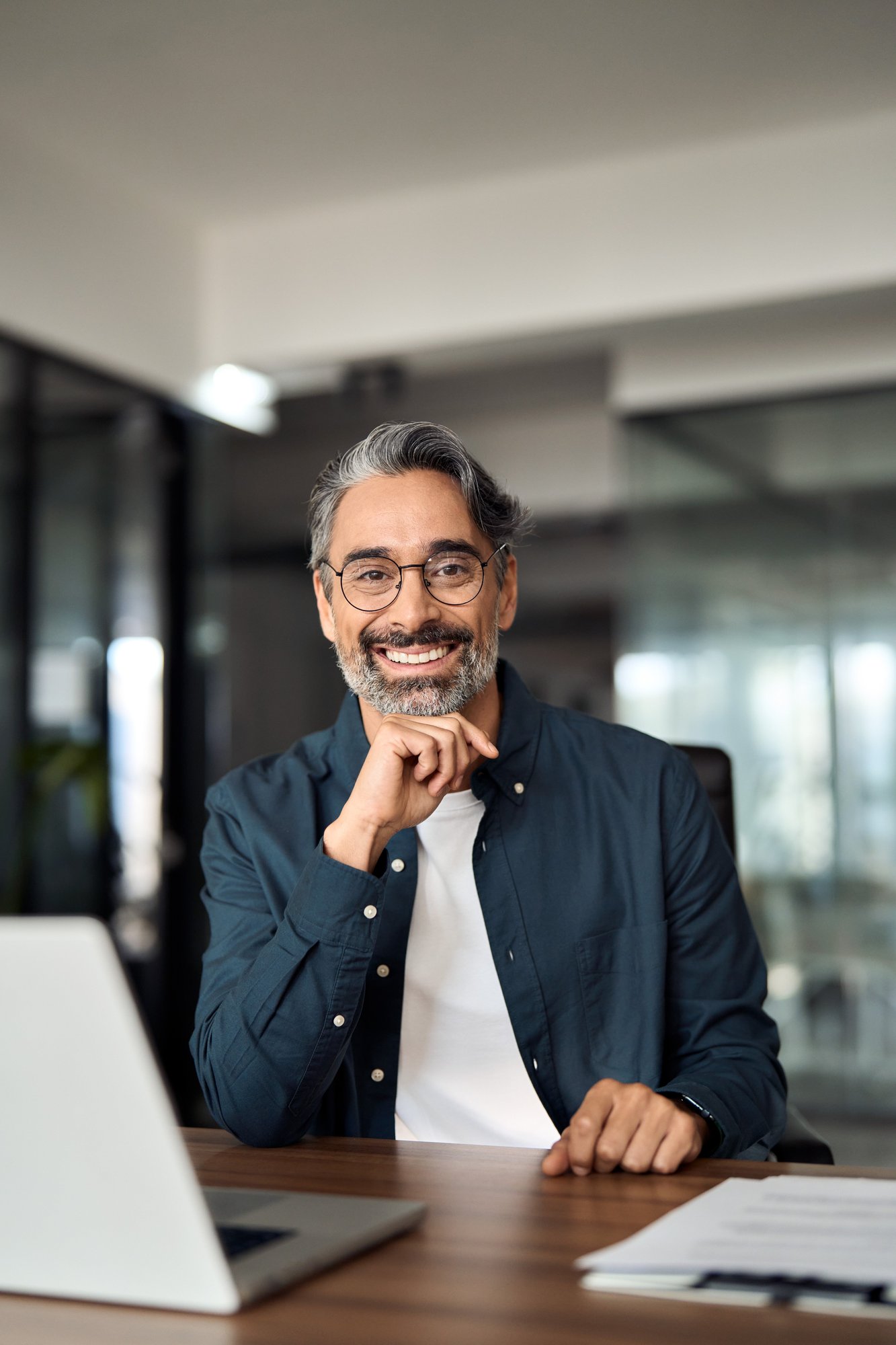 Man at desk with computer in office