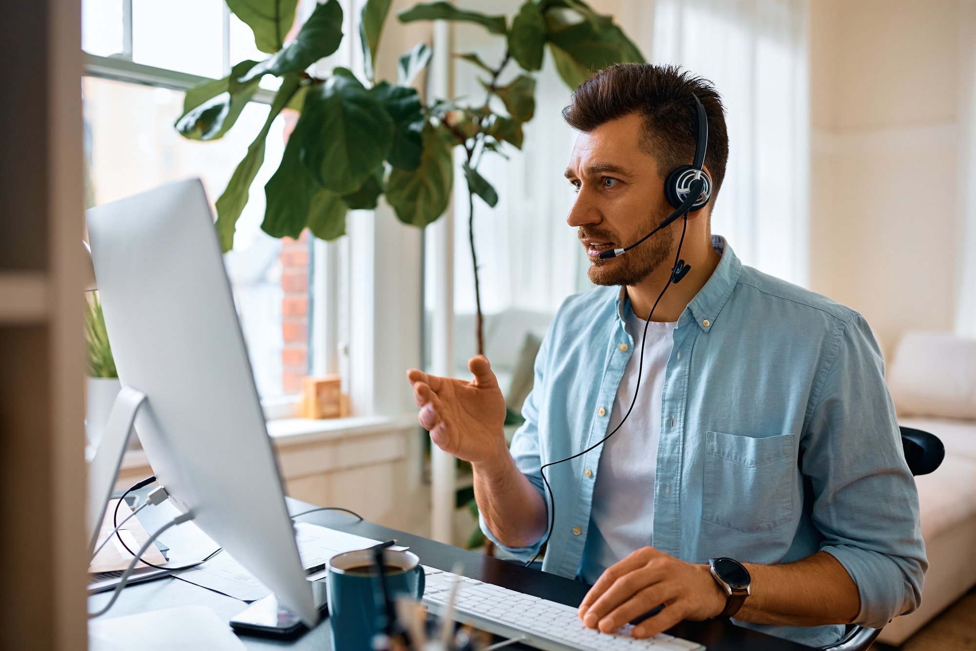 Male taking a conference call