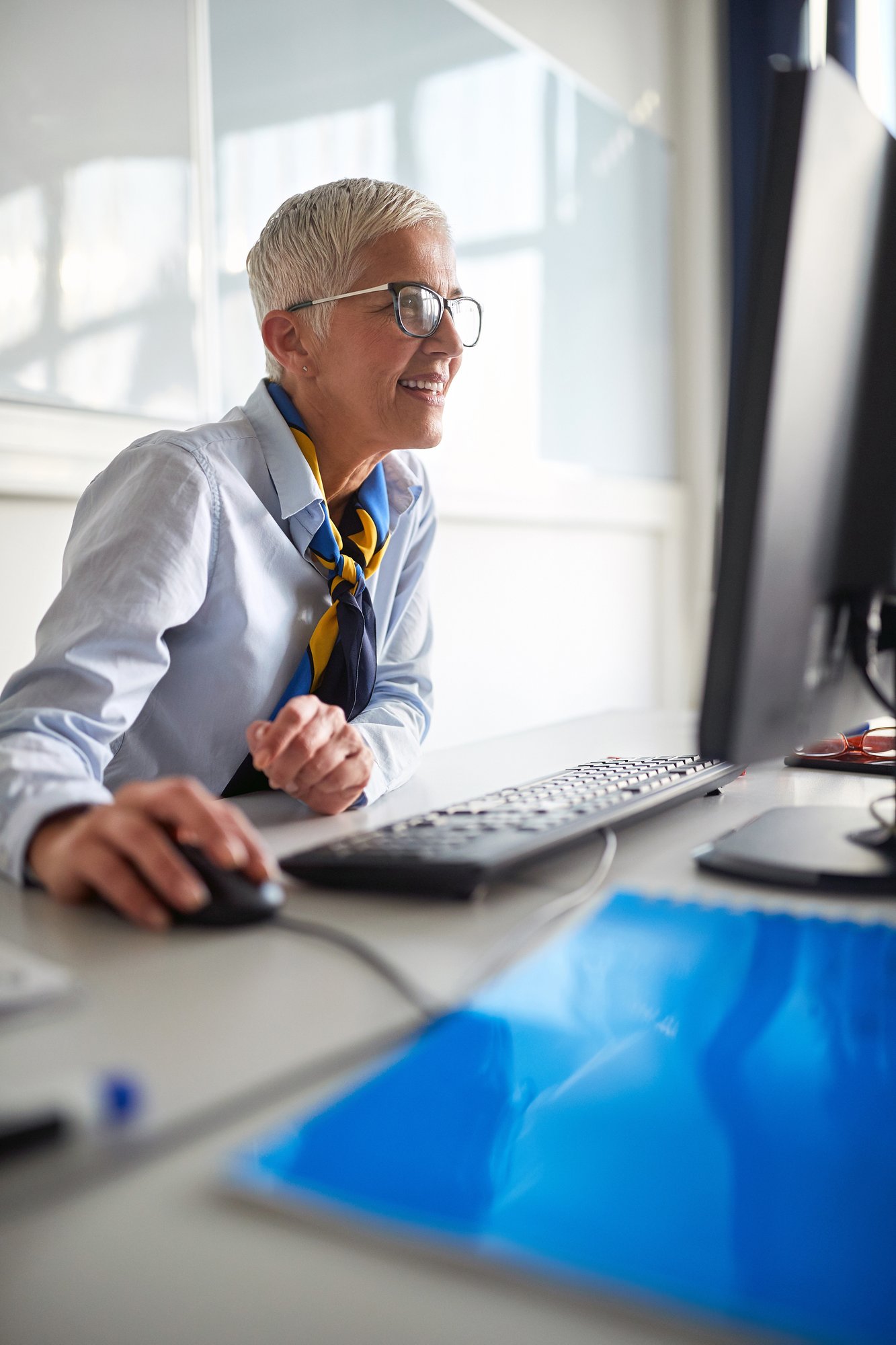 Mature woman working on computer