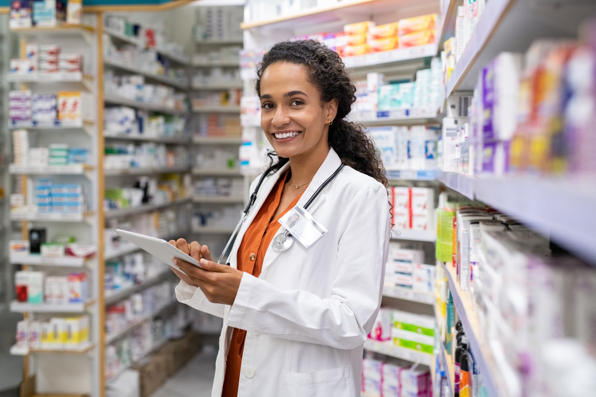 Pharmacist using a tablet